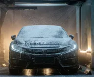 Clean car in wash tunnel